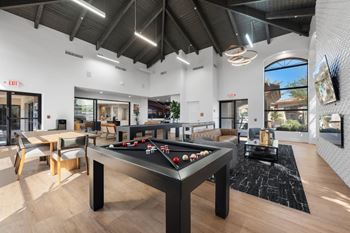Entertainment room with games and bumper pool